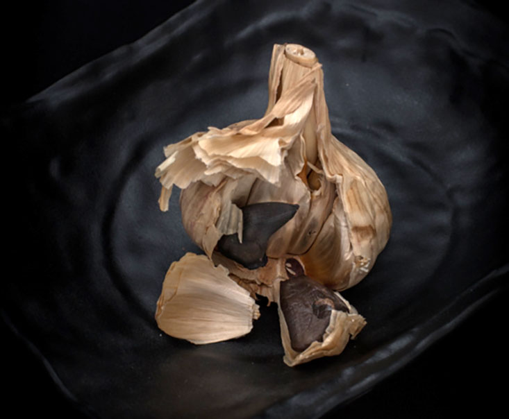 a bulb of black garlic