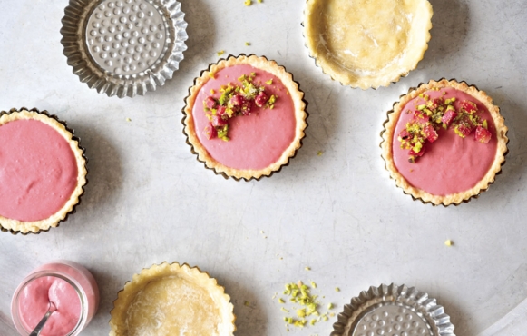 Rhubarb Curd Tarts with raspberries and pistachios
